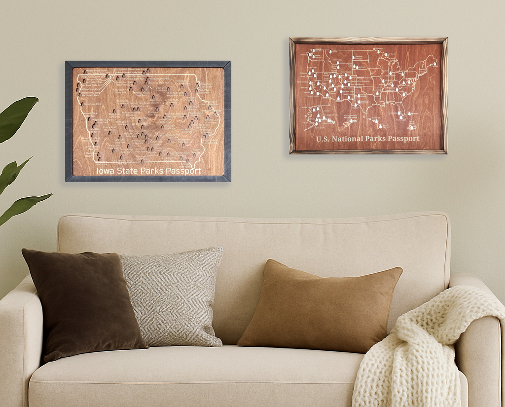 Iowa State Parks and United States Parks wood art pieces above couch.